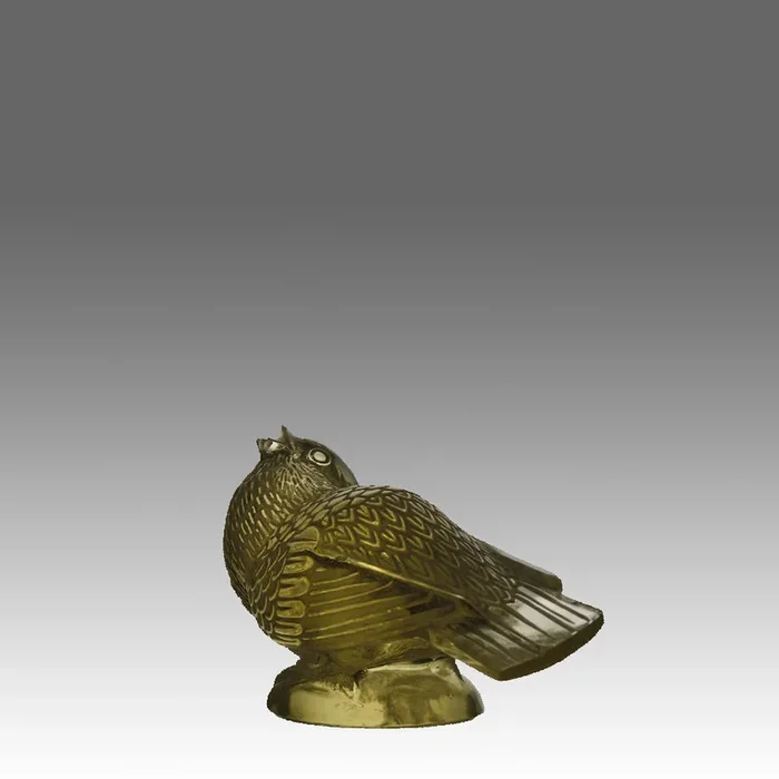 “Chardonneret Moqueur” by Rene Lalique
